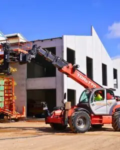 Toretto Manitou telehandler delivering materials to an upper floor on an Adelaide building site