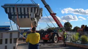 Toretto Manitou Telehandler delivering materials to an upper floor on an Adelaide building site